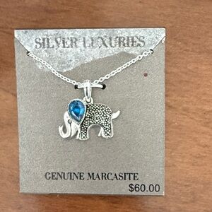 Silver Elephant Pendant Necklace with Blue Gem